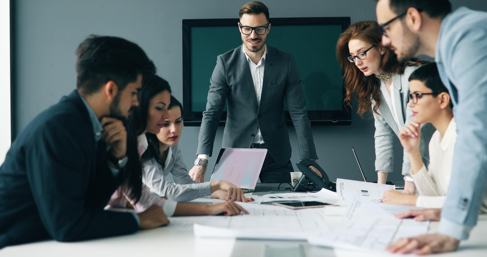 people discussing in business meeting