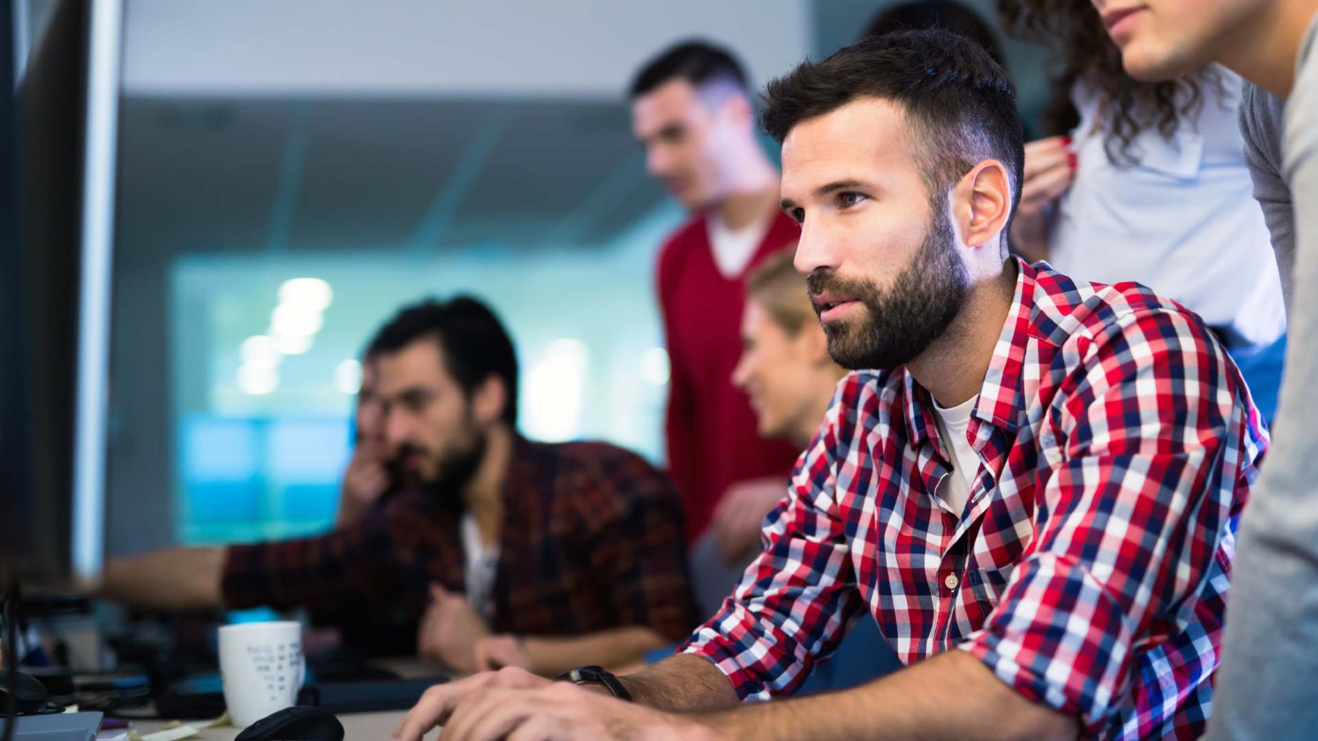 background image of an AWS IT expert in foreground